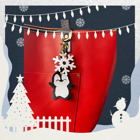 Embrace Winter Magic with Our Handcut Penguin and Snowflake Charm