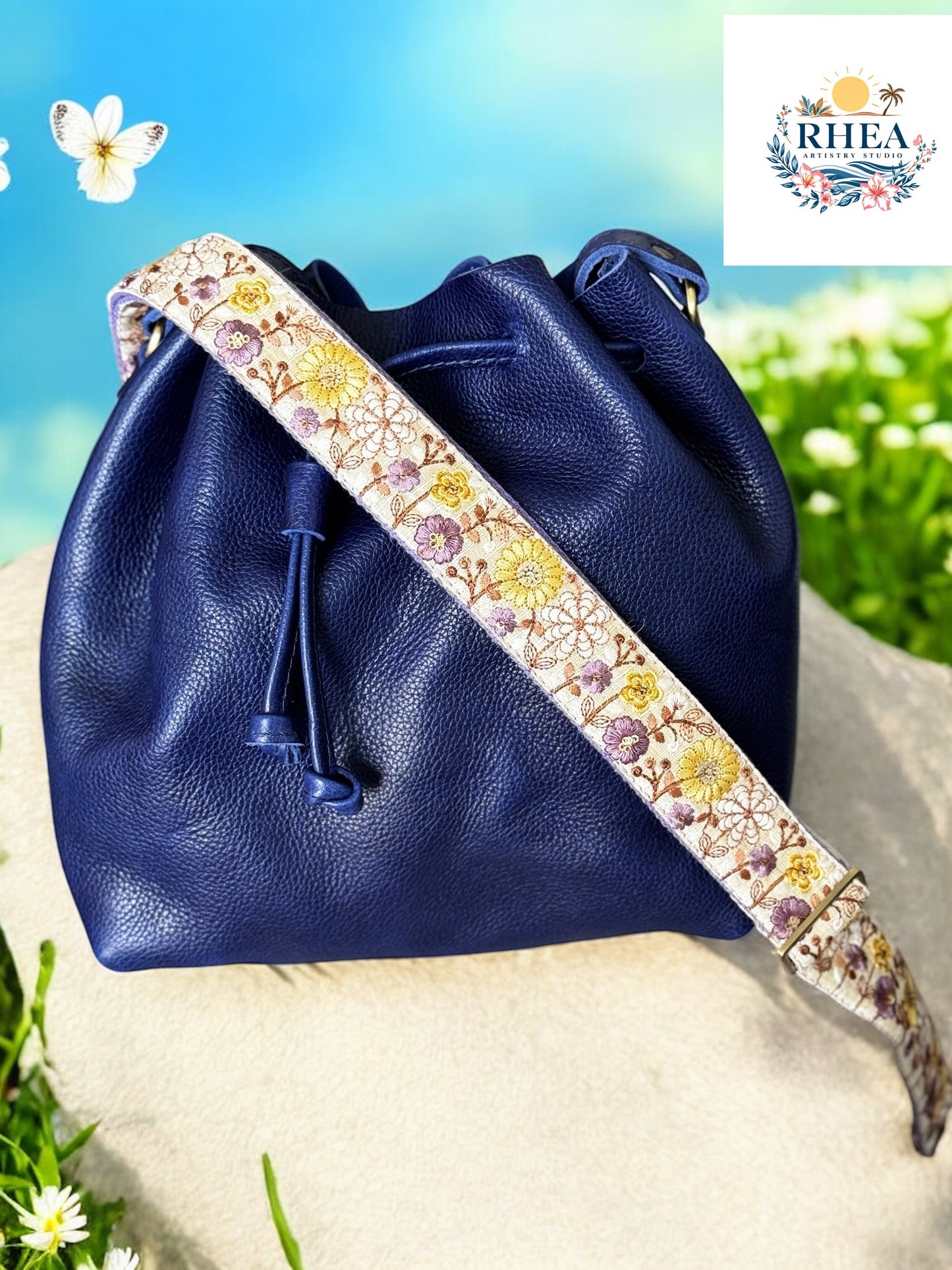 purple strap on a purple bag