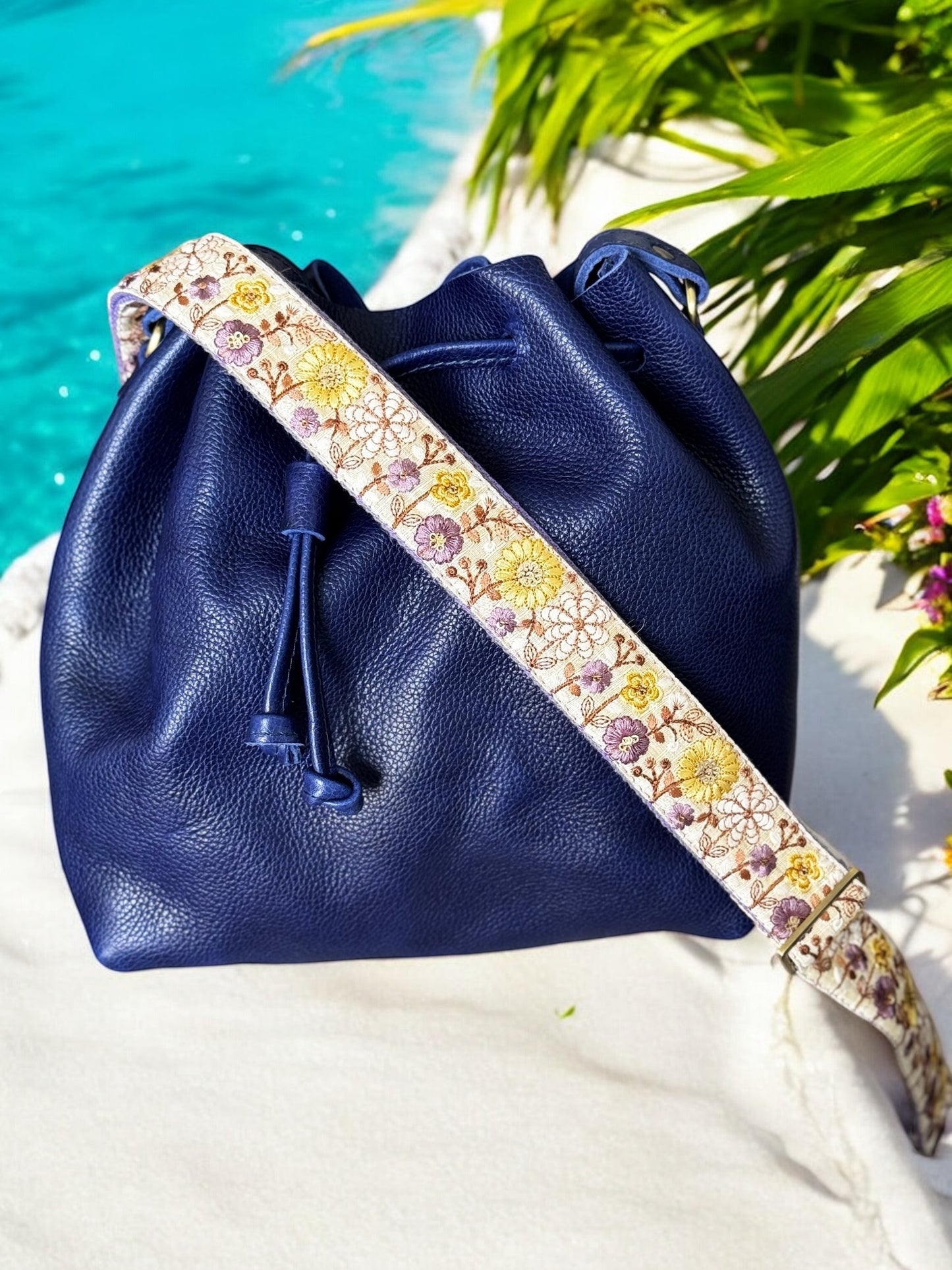purple strap on a purple bag