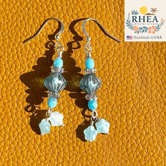 Aqua Stardrop Earrings handmade with Czech glass beads and delicate star accents, elegant artisan earrings inspired by ocean light and starlit skies.