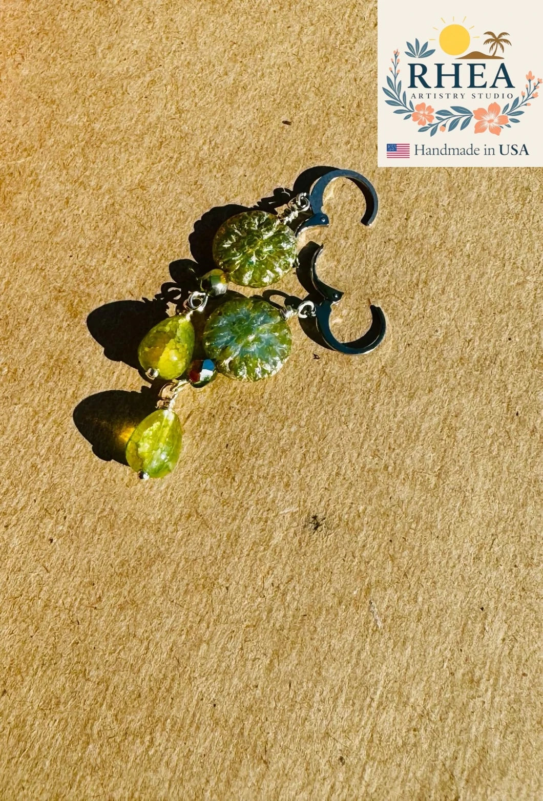Stylish Avocado Green Dahlia earrings with silver accents, handmade with Czech beads for a refined artisan accessory.