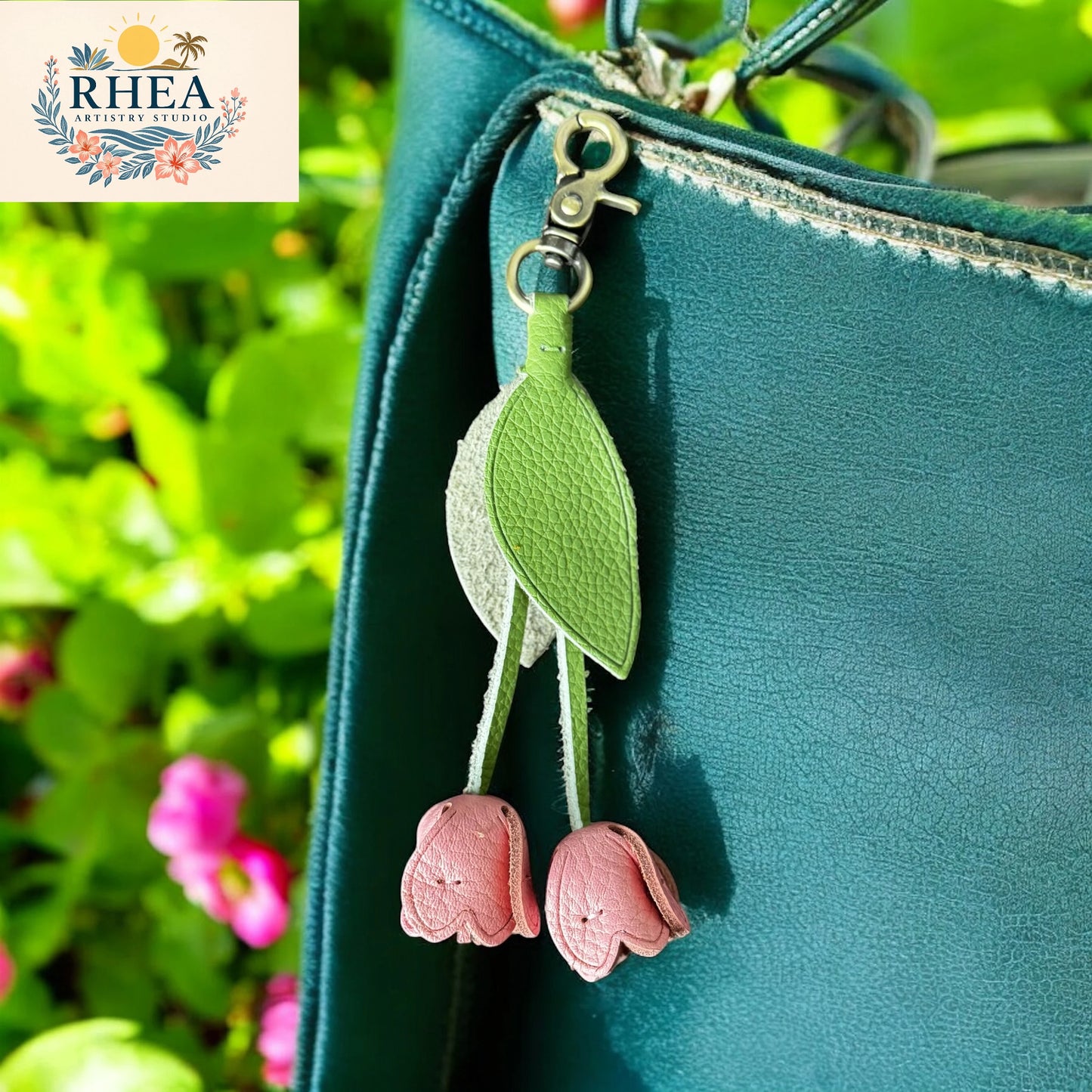 Bubblegum pink leather tulip keychain handmade by Rhea Artistry Studio. Sustainable floral accessory crafted with genuine leather—ideal as a purse charm, bag tag, or thoughtful gift.
