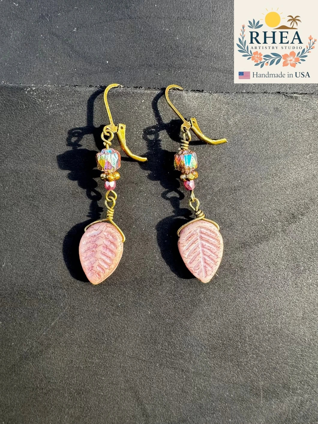 Beautiful Celestial Glow handmade earrings featuring Czech glass beads, artisan-crafted with a shimmering celestial motif.