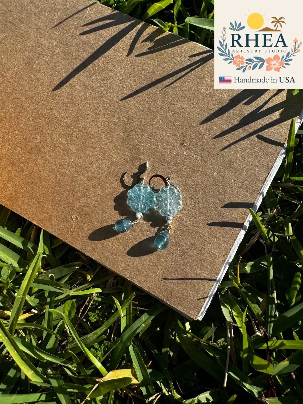 Handcrafted Daisy Blue Silver Drop earrings featuring Czech beads, artisan-made with a delicate floral design.