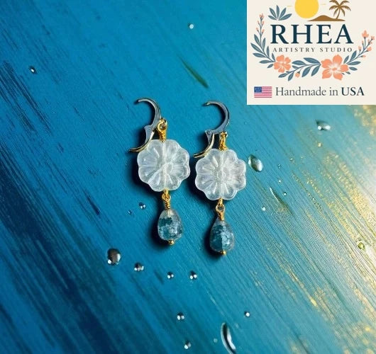 Handcrafted Daisy Blue Gold Drop earrings featuring Czech beads, artisan-made with a delicate floral design.