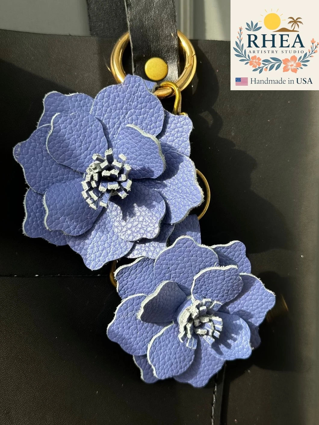 Handcrafted Everbloom Leather Flower Large in Blue Bell, styled as a leather purse charm and bag accessory.
