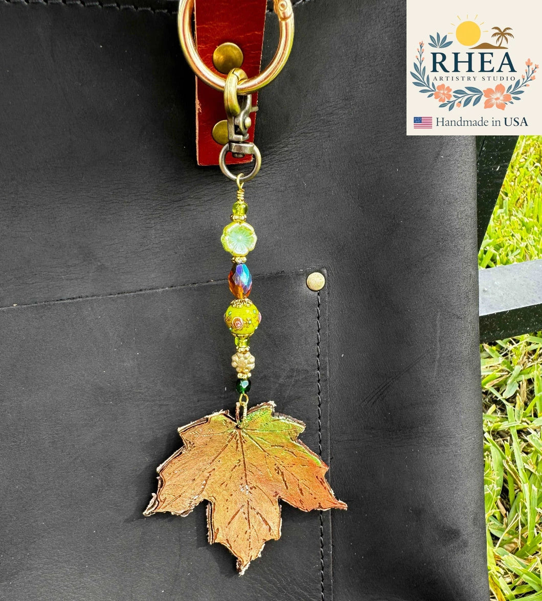 Handcrafted Fairy Forest Charm – Leafy Oasis featuring lush green leaf-inspired details, artisan-made bag charm, purse accessory, and keychain.