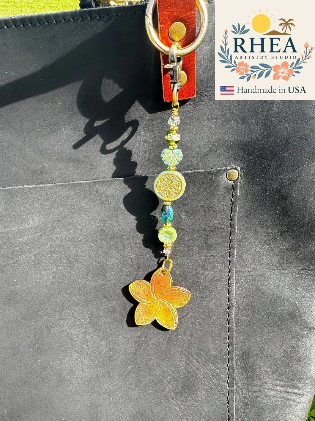 Handcrafted Fairy Forest Charm – Plumeria Pond featuring serene floral details, artisan-made bag charm, purse accessory, and keychain.