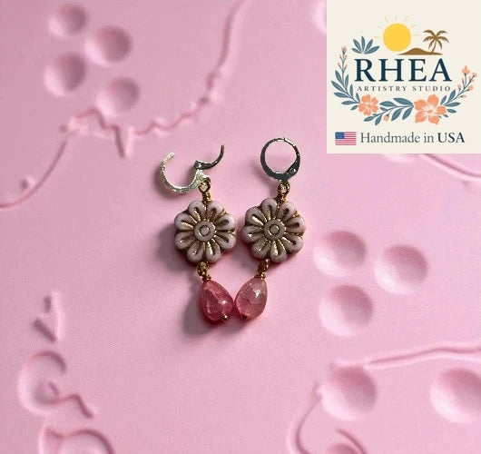 Elegant handmade Daisy Drop short earrings with pale pink Czech beads and gold wash accents, artisan floral jewelry.