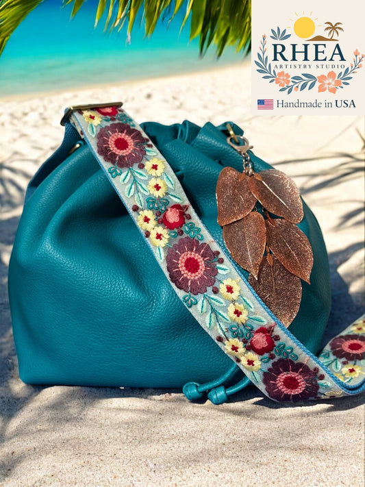 Elegant handmade purse charm featuring real electroplated metallic leaves, designed as a natural-inspired accessory for bags and keychains.