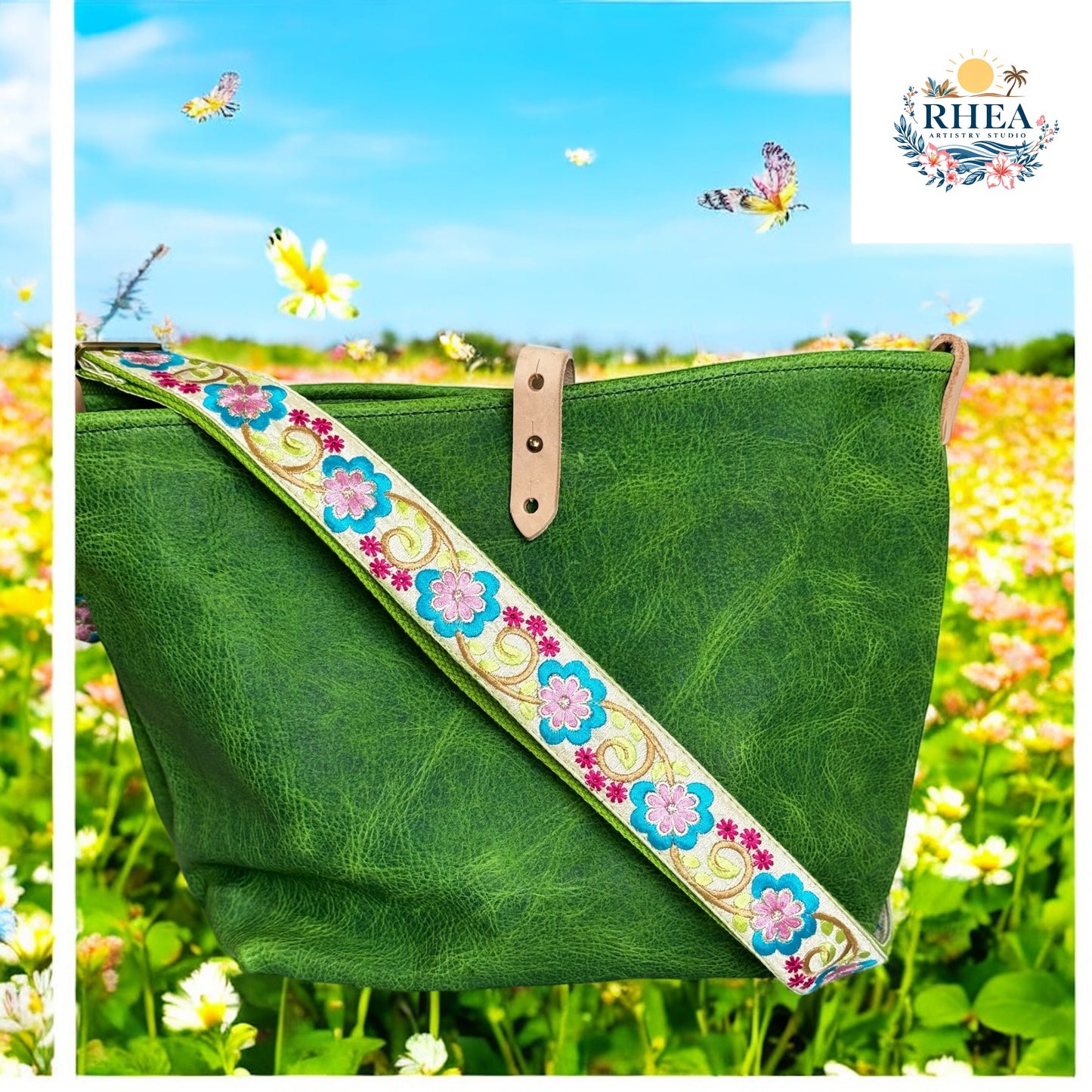 A vibrant lime green replacement strap featuring bold embroidered flowers in blue, pink, and fuchsia, finished with golden vine accents. Styled with a matching green leather handbag against a blooming wildflower field.