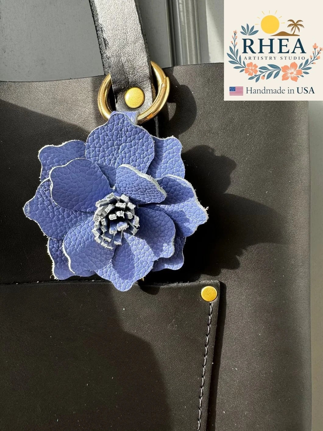 Rhea Artistry Studio blue bell leather flower charm with lobster clasp and split ring, handmade from full grain leather.