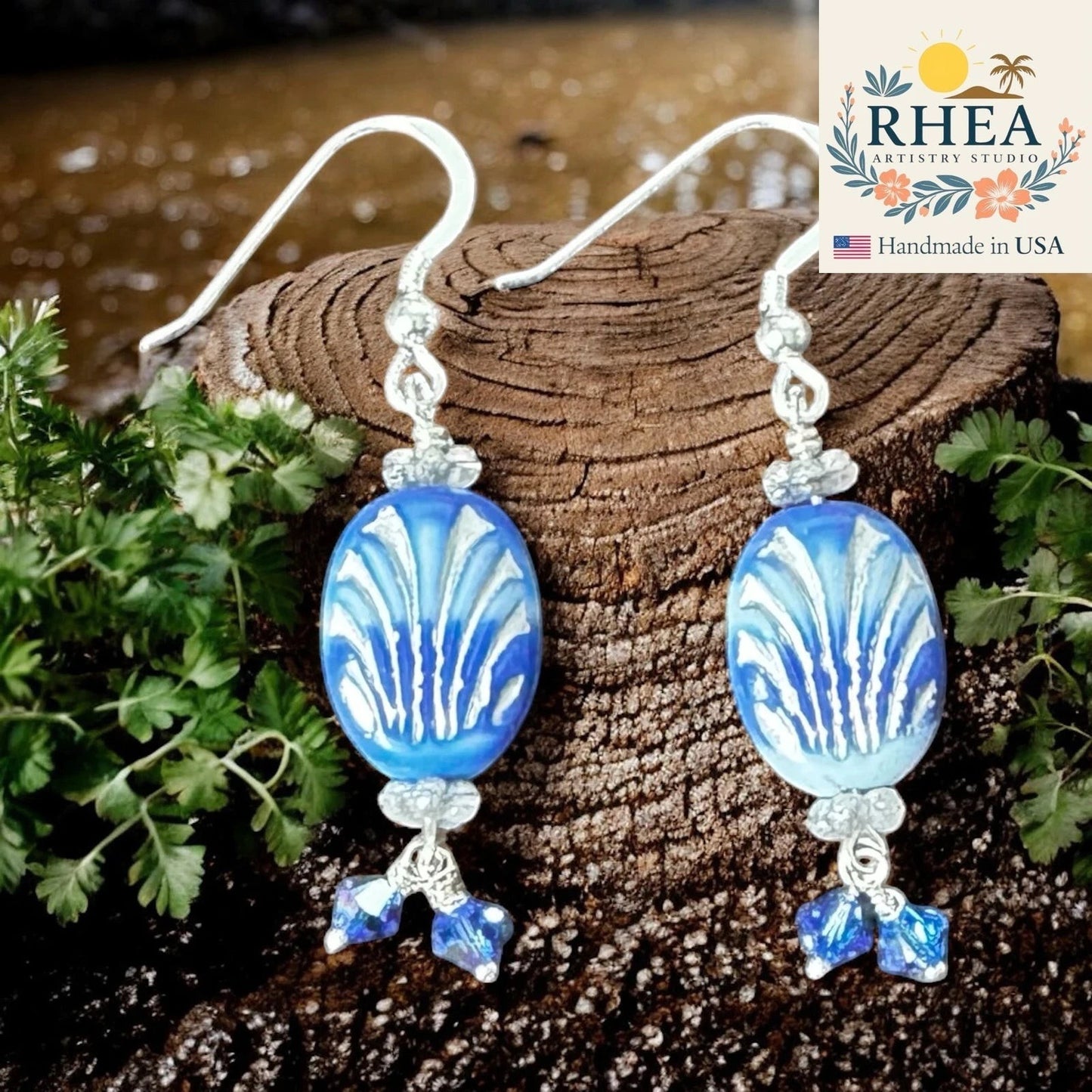 Rhea Artistry Studio coastal blue Czech glass earrings with Austrian crystals and silver metal hooks, inspired by ocean waves.