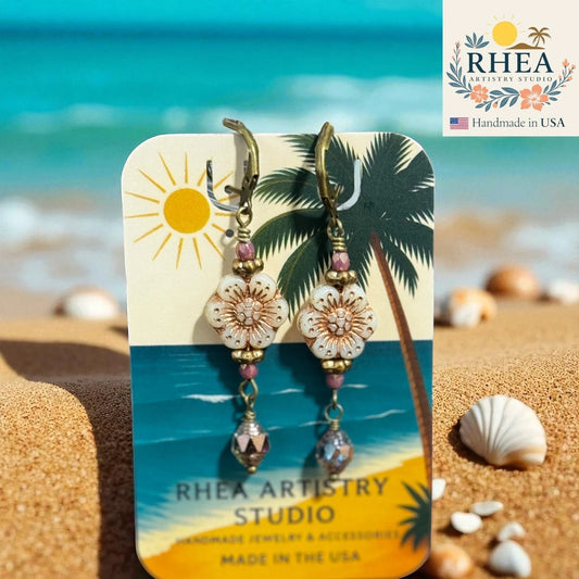 Rhea Artistry Studio floral dangle earrings with Czech glass beads, rose gold accents, and antique brass French hooks. Approx. 1.5 inches.