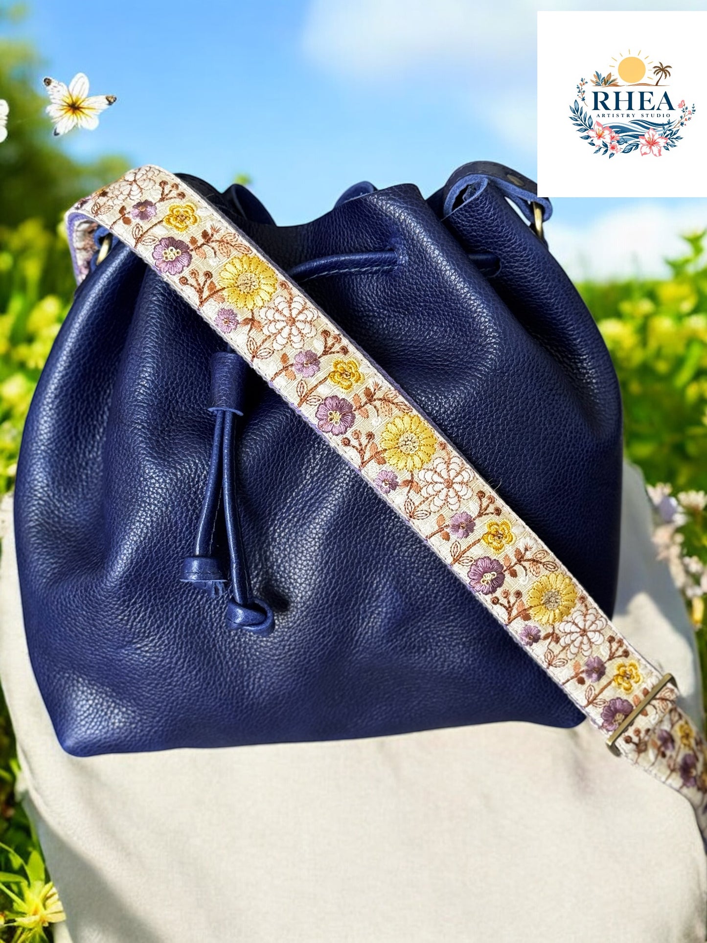 purple strap on a purple bag