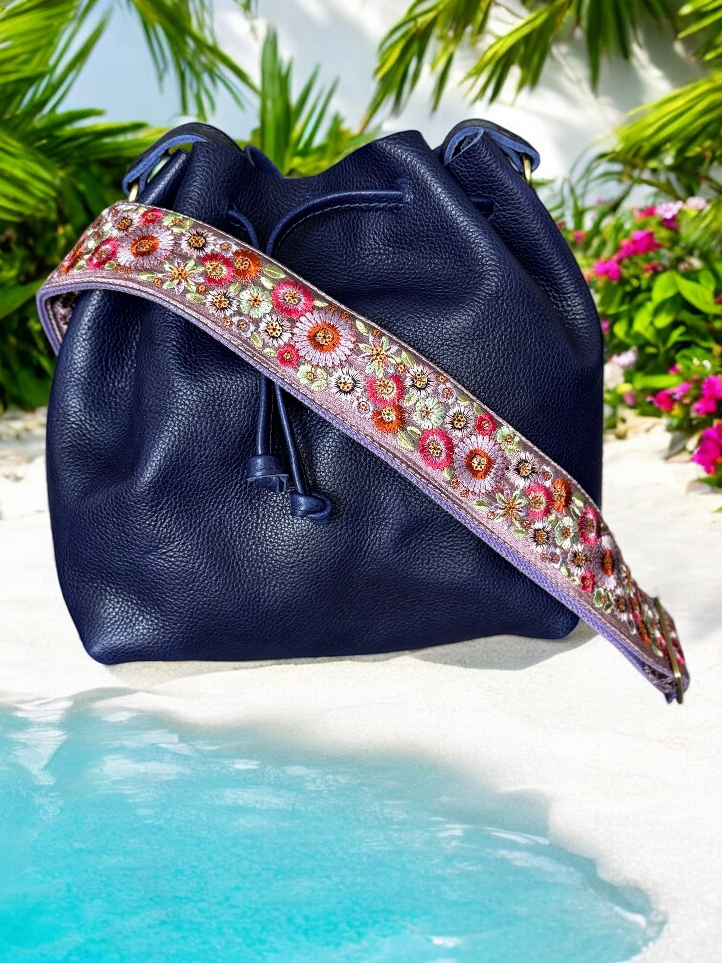 purple strap on a purple bag