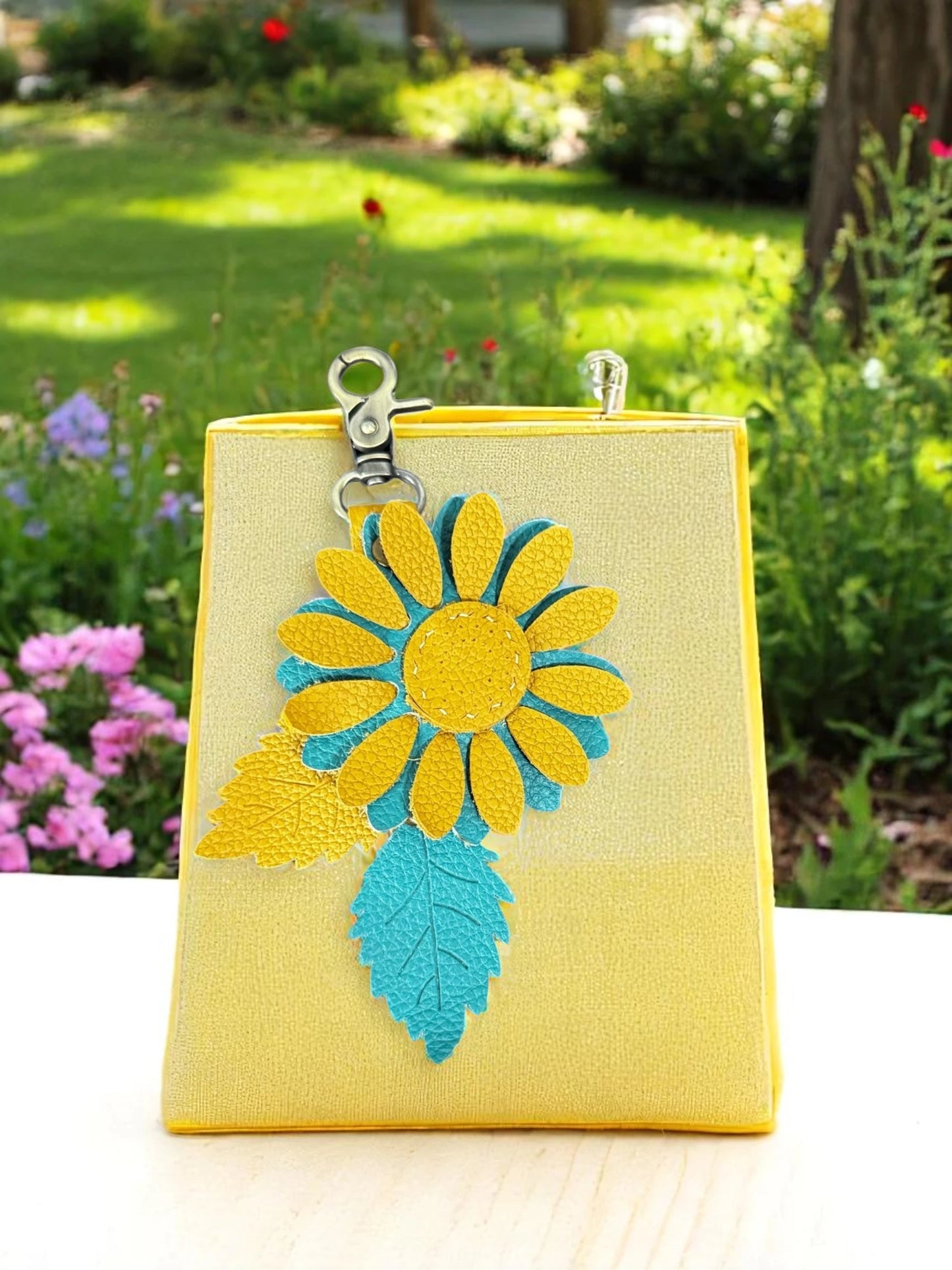 Mustard and Turquoise leather daisy charm with brushed brass clasp