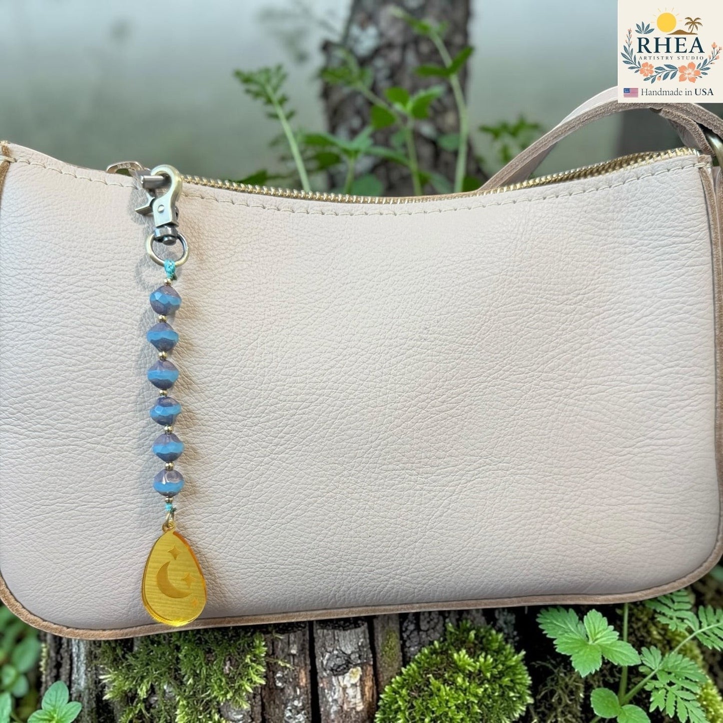 Blue moon bag charm with handknotted beadwork and engraved pendant