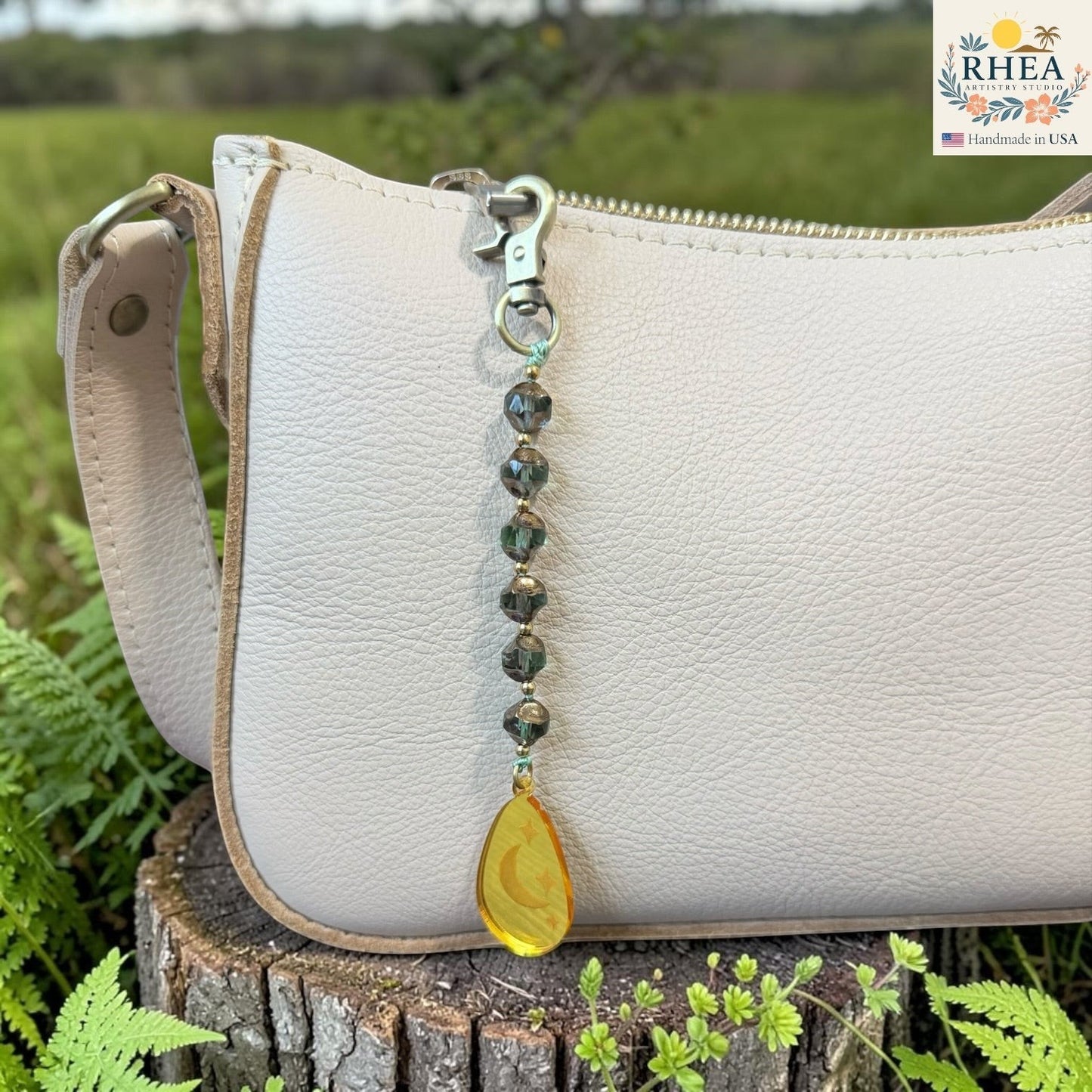 Artisan handbag charms with faceted glass beads and hand-finished pendant designs