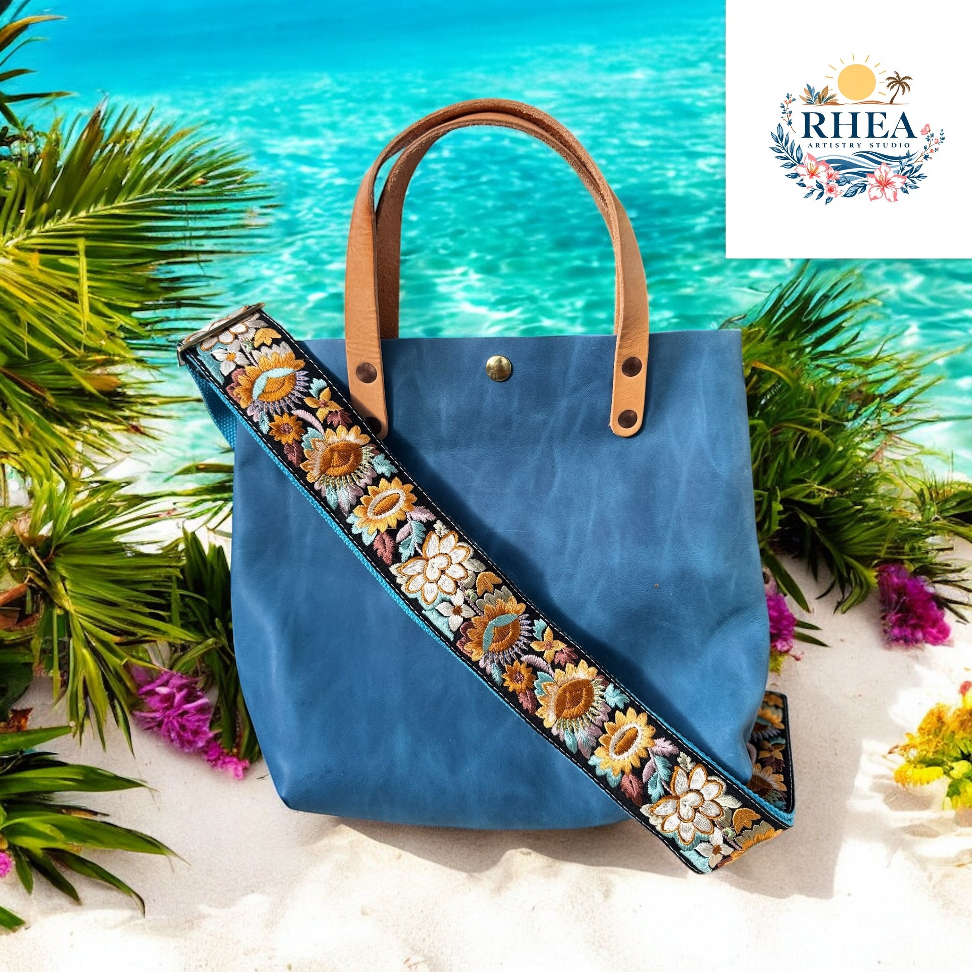 Ethically crafted embroidered replacement purse strap in aqua blue, featuring intricate sunflower motifs on a cream  background on a teal bag