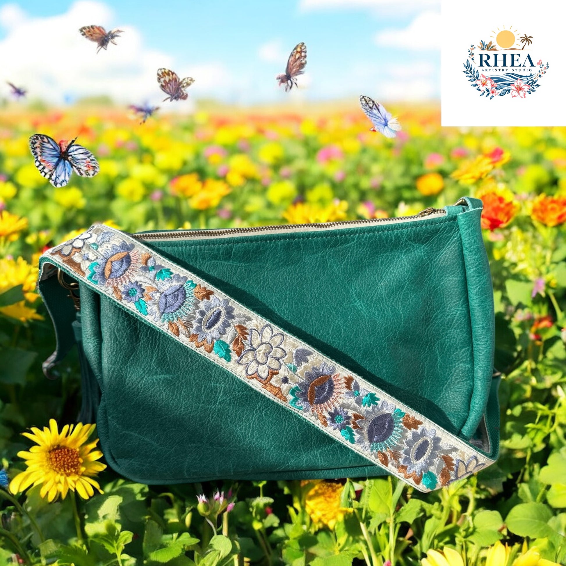 Ethically crafted embroidered replacement purse strap in sea foam green featuring intricate sunflower motifs on a cream background at garden