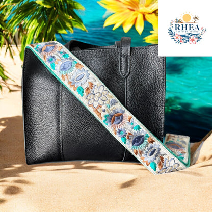 Ethically crafted embroidered replacement purse strap in sea foam green featuring intricate sunflower motifs on a cream background.
