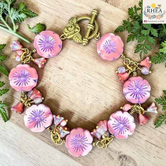 Handmade pink floral glass bead bracelet with brass toggle clasp 