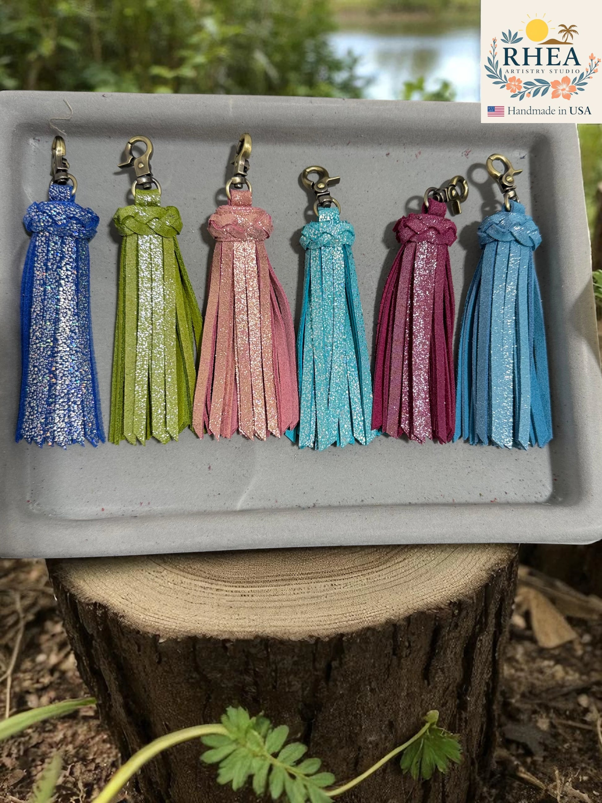 L-R: Royal Blue, lime green, rose pink, aqua, berry pink, indigo leather tassels
