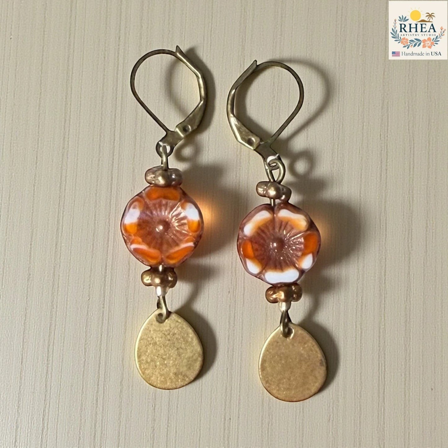 Lightweight handmade earrings with premium materials and secure hooks in amber