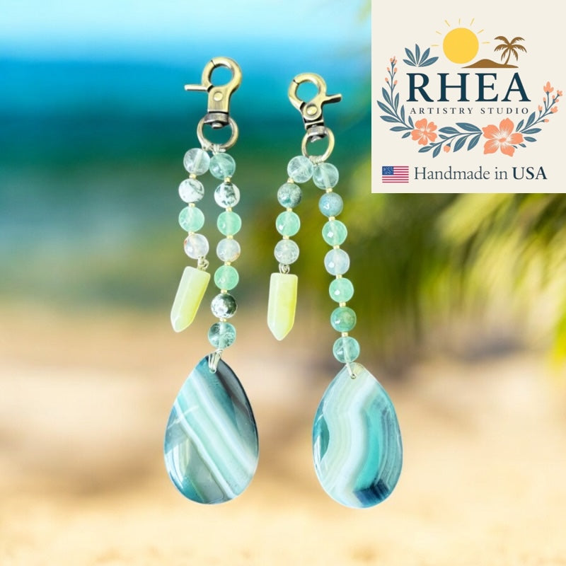 Handcrafted Atlantic Haze double-strand gemstone bag charm featuring ocean-inspired hues, artisan-made for purses and keychains.