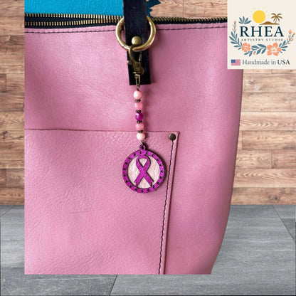 Elegant handmade Awareness bag charm and keychain accessory, crafted for purses, handbags, and tote bags with a meaningful touch.