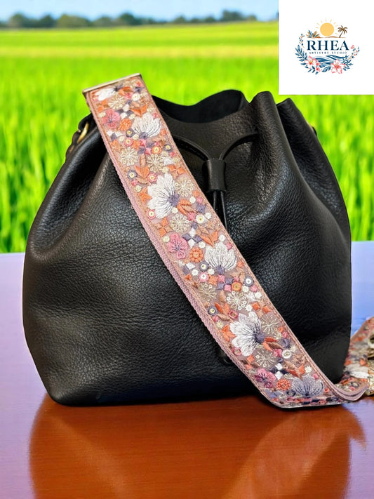 botanica noir replacement strap near paddy fields background