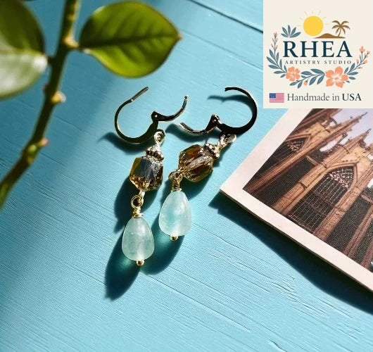 Handcrafted Cathedral Light Blue Silver Drop earrings featuring Czech beads, artisan-made with a delicate design.