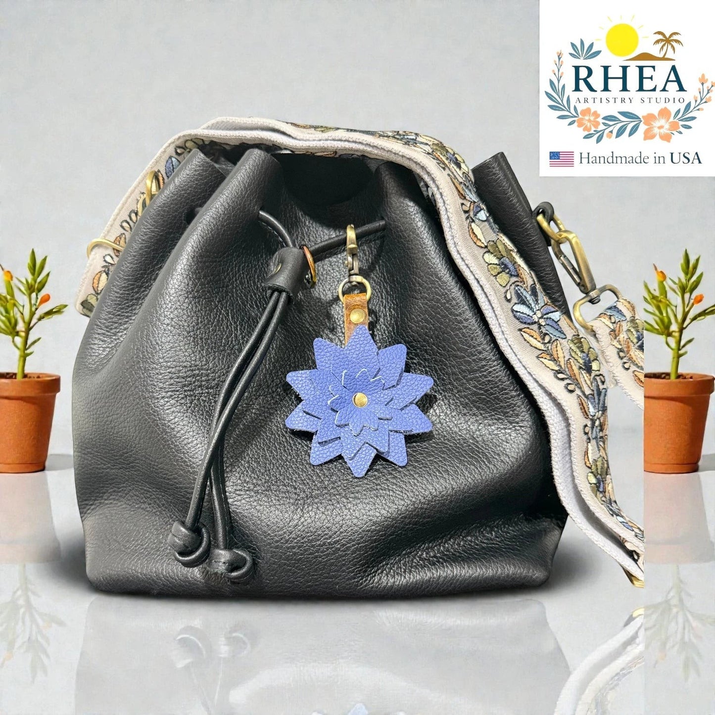 Cornflower blue layered leather flower charm with textured leather