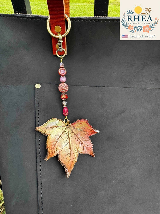 Handcrafted Fairy Forest Charm – Fairy Dust Pink featuring soft pastel floral details, artisan-made bag charm, purse accessory, and keychain.