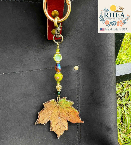 Handcrafted Fairy Forest Charm – Leafy Oasis featuring lush green leaf-inspired details, artisan-made bag charm, purse accessory, and keychain.