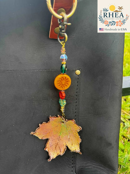 Handcrafted Fairy Forest Charm – Radiant Sun featuring warm golden floral details, artisan-made bag charm, purse accessory, and keychain.