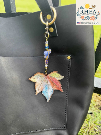 Handcrafted Fairy Forest Charm – Rainbow Elephant featuring colorful elephant-inspired design, artisan-made bag charm, purse accessory, and keychain.