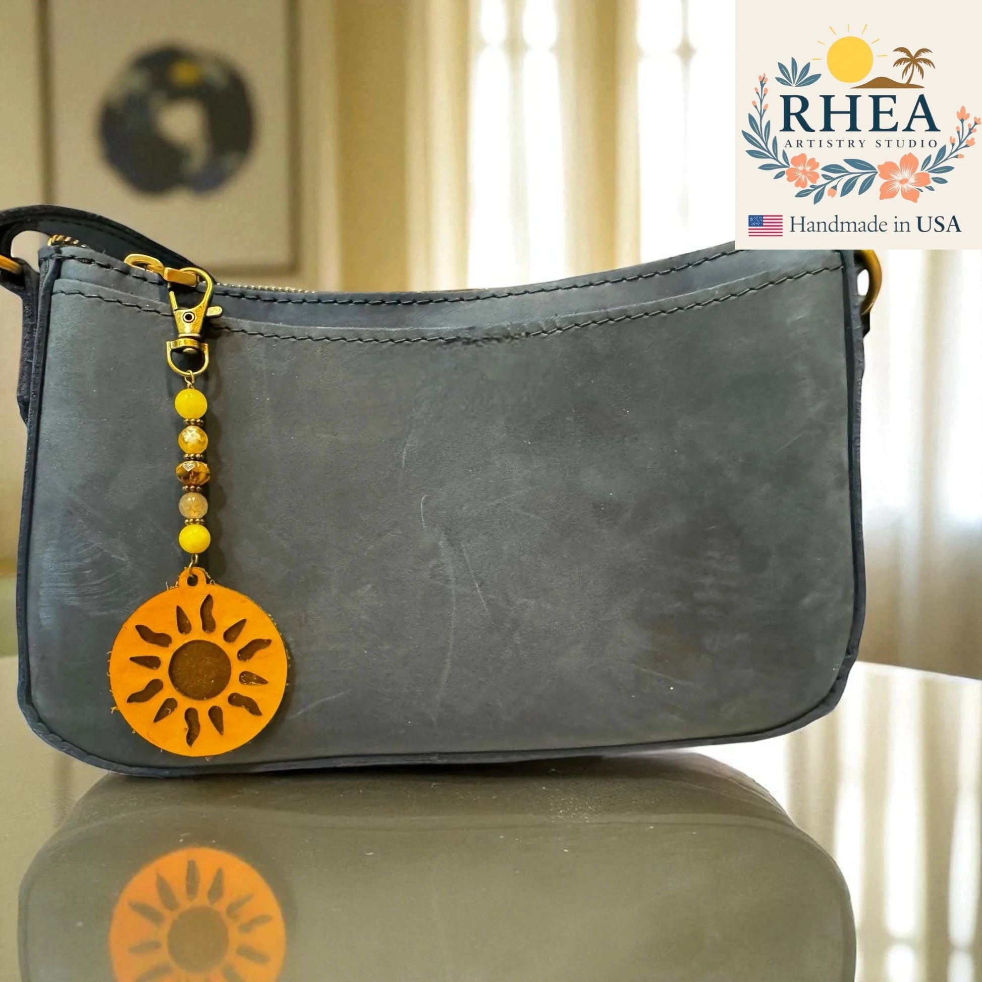 Artisan handmade Sun Charm crafted with yellow gemstone beads and copper detail, versatile keychain or purse accessory.