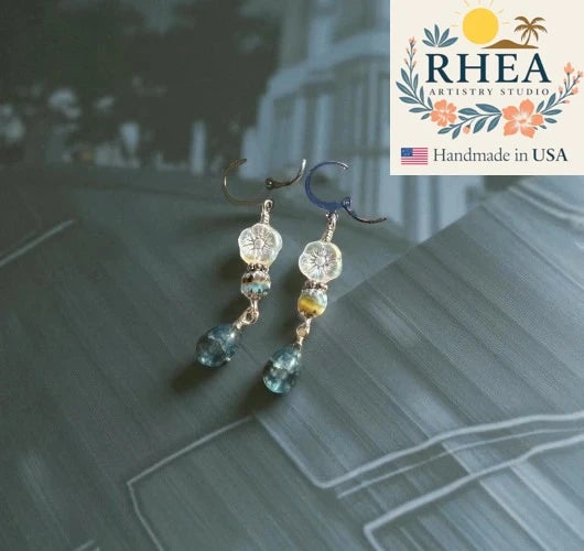 Handcrafted Hibiscus Cathedral Pewter Silver Drop earrings featuring Czech beads, artisan-made with a bold floral design.
