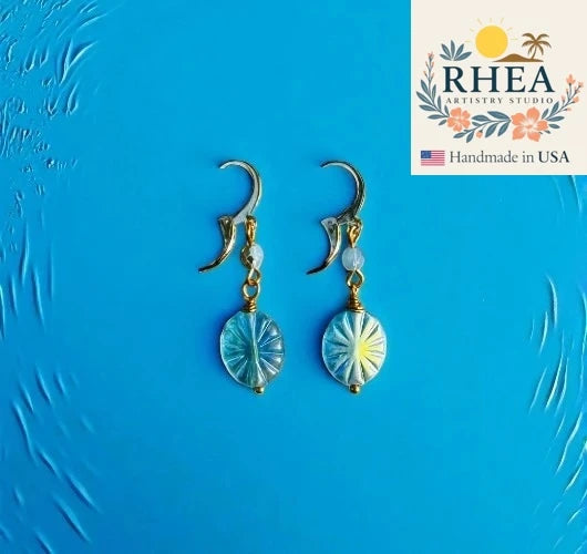 Handcrafted Starburst Oval Blue earrings featuring Czech beads, artisan-made with a radiant starburst design.