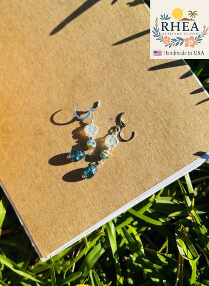 Stylish Hibiscus Cathedral Silver Drop earrings, handmade with Czech beads for a refined artisan accessory.