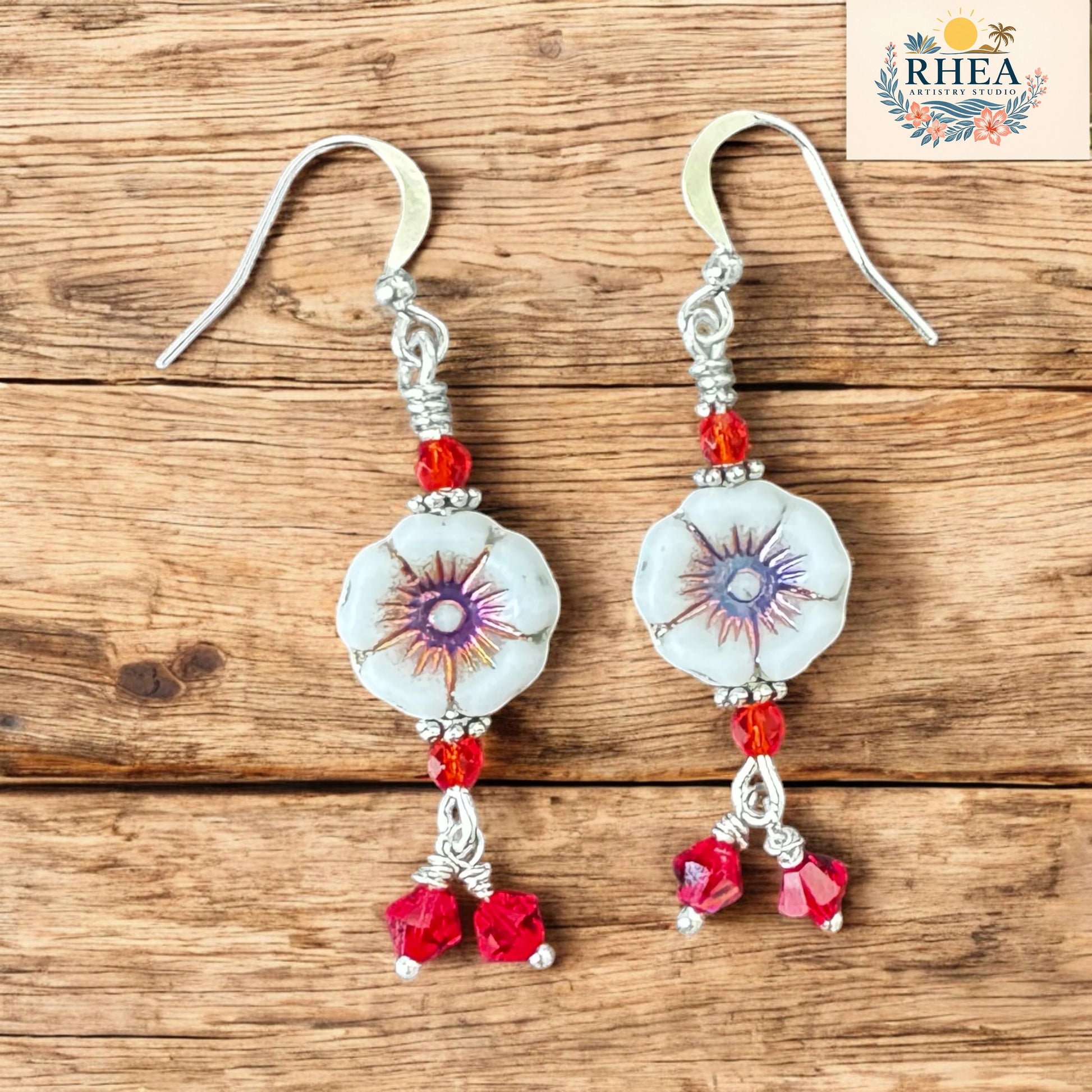Handmade earrings with Czech hibiscus beads, vintage Austrian crystals, and silver-plated hooks. Tropical, vibrant, and full of handcrafted charm.