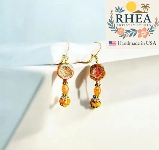 Elegant handmade Mustard Hibiscus Drop earrings with Czech beads, designed as unique artisan floral jewelry.