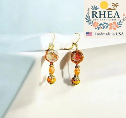 Elegant handmade Mustard Hibiscus Drop earrings with Czech beads, designed as unique artisan floral jewelry.