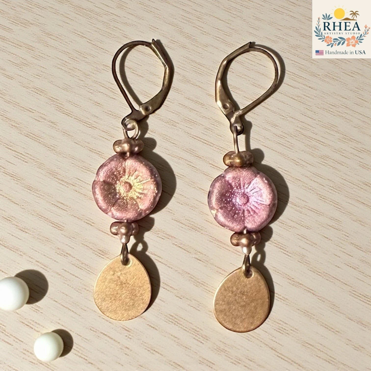 Lightweight handmade earrings with premium materials and secure hooks in copper and pink mix