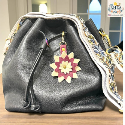 Leather flower keychain with swivel lobster clasp detail