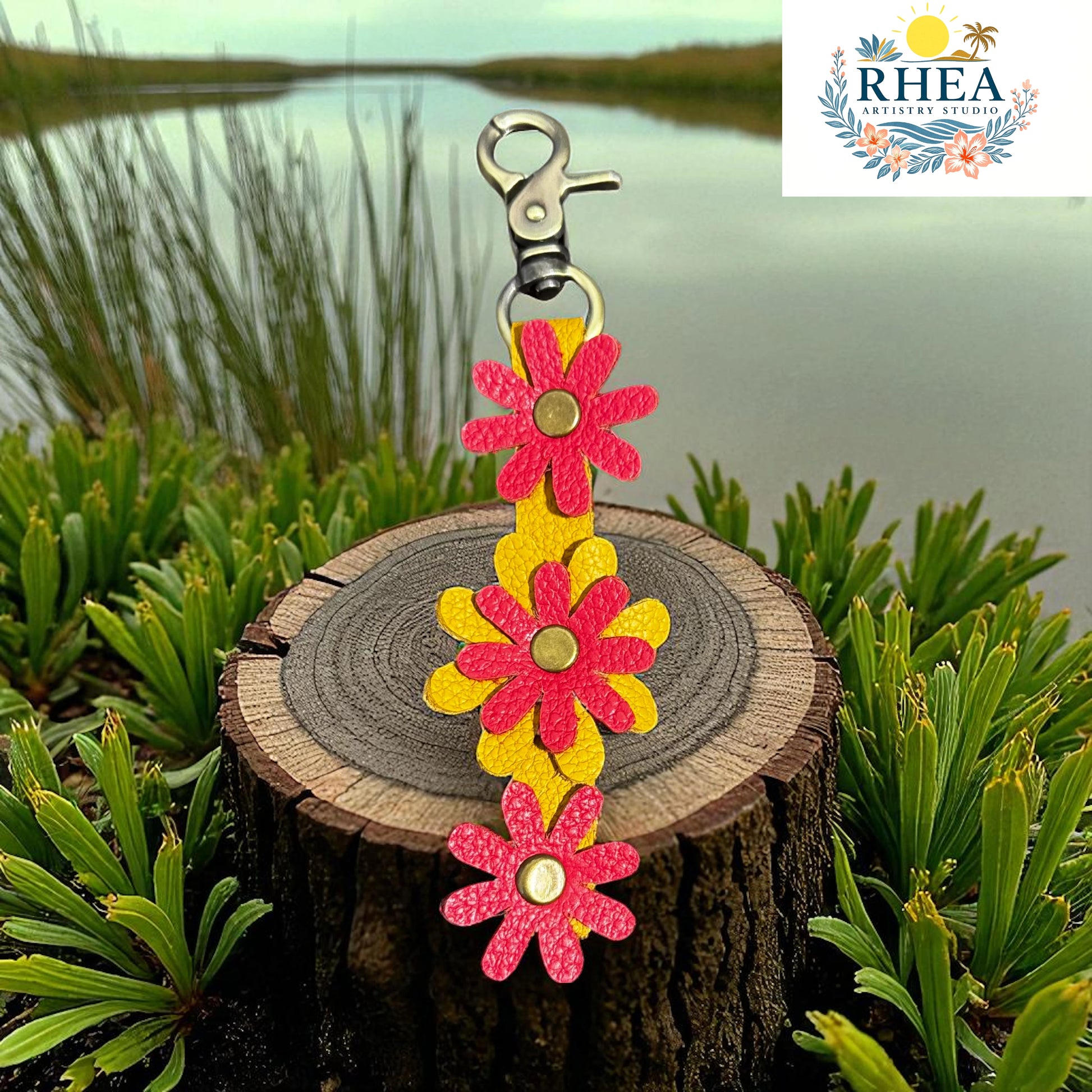 Floral keychain on a wooden stump with a natural background