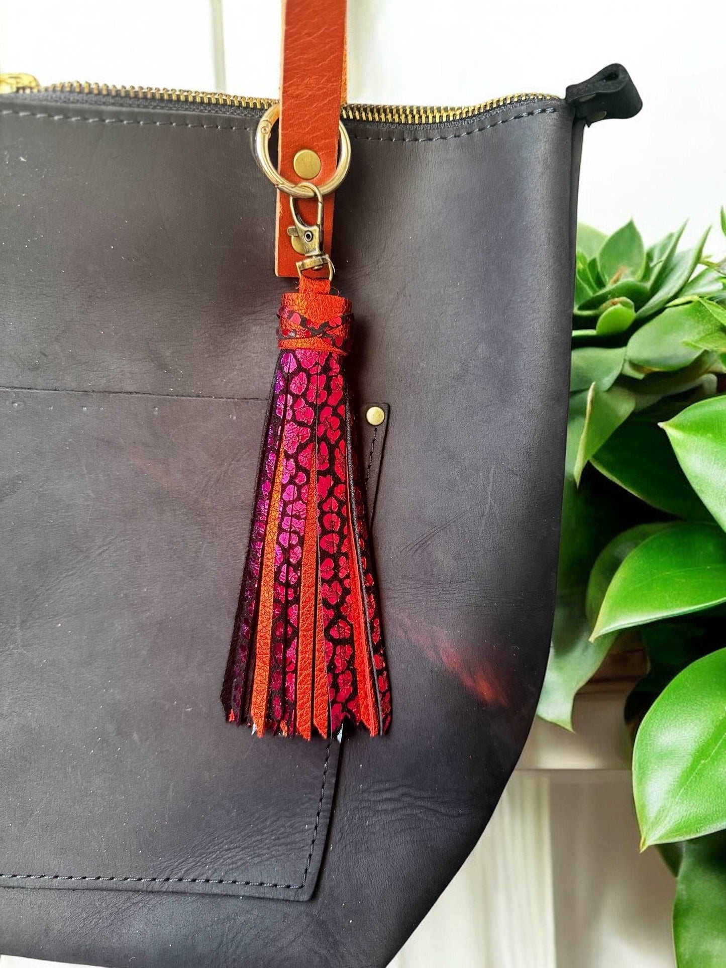 image of a purse with multi colored tassel