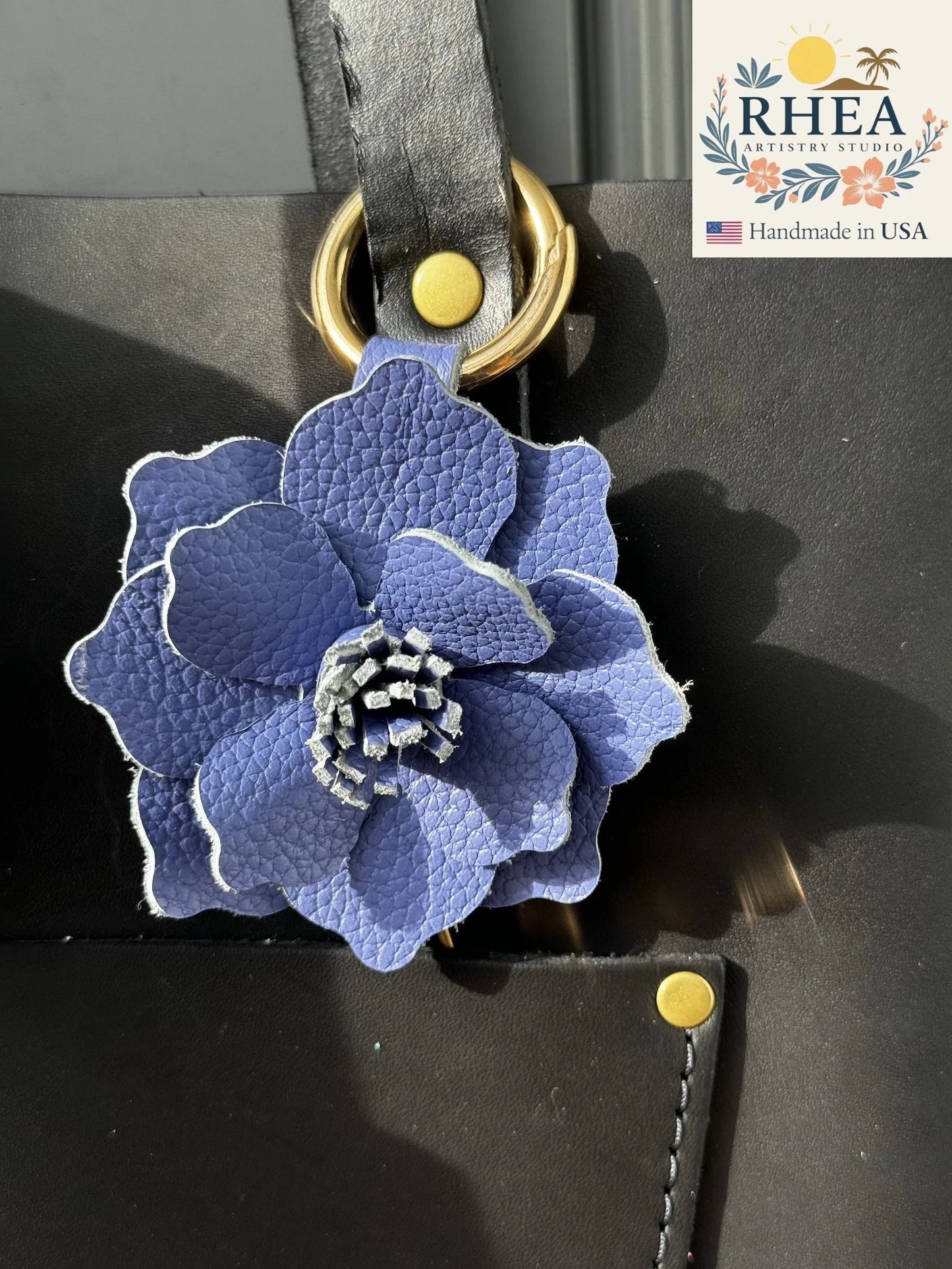 Rhea Artistry Studio blue bell leather flower charm with lobster clasp and split ring, handmade from full grain leather.